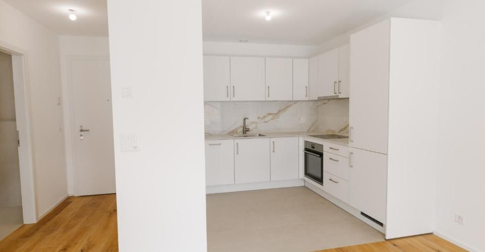 Très joli appartement de 2.5 pièces au 1er étage avec grand balcon - J104 - Appartement 2.5 pièces - image - 1
