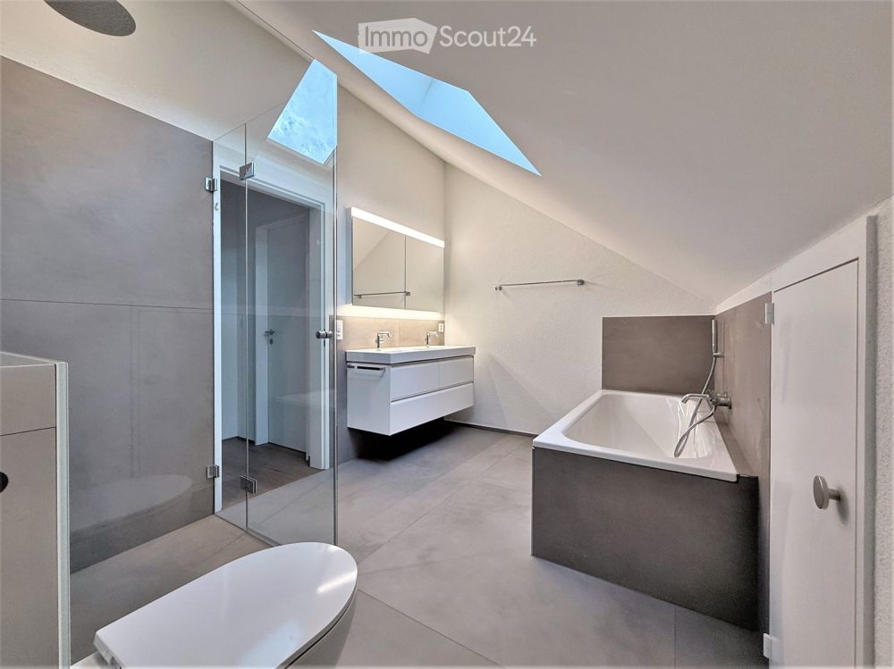 Grosse moderne 3.5 Zimmer Duplex-Wohnung mit Cheminée und Bergsicht - Wohnen über zwei Etagen - Bild 4