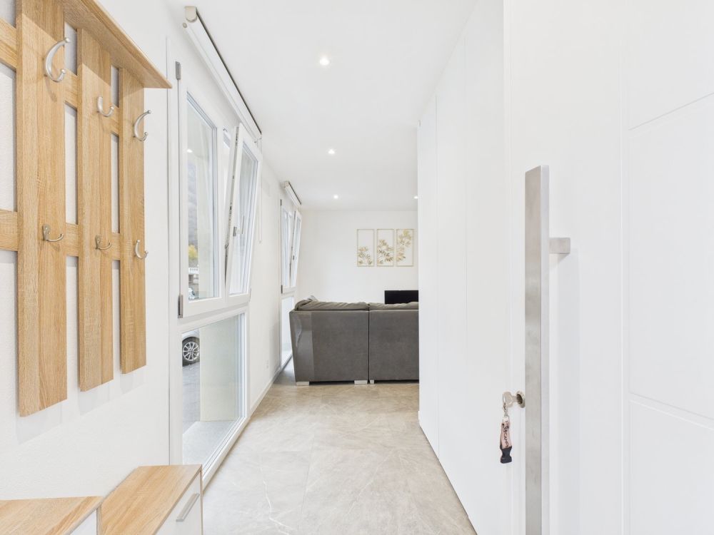 NUOVA COSTRUZIONE:APPARTAMENTO DI 3,5 LOCALI CON GIARDINO E POSTO AUTO - Bild 4