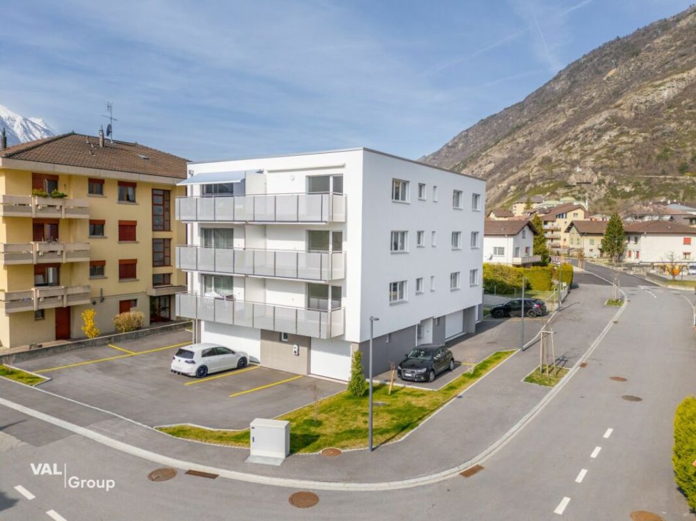 Helle 3.5-Zimmer-Neubauwohnung mit Balkon - Wohnen in Steg - Bild 1