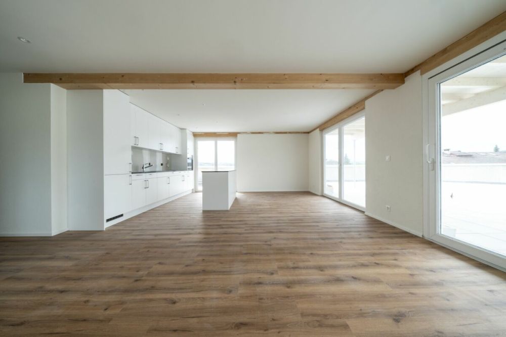 Exklusive 4.5-Zimmer-Attikawohnung mit ca. 163 m² Sonnenterrasse - Erstbezug im Neubau - Bild 8