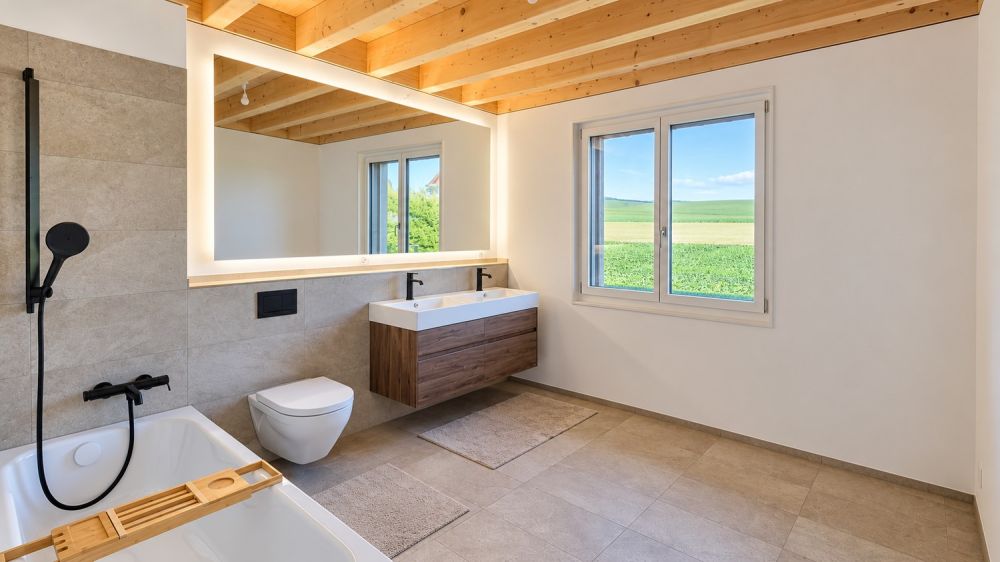 Modernes 6.5-Zimmer-Haus mit Garten und zwei Tiefgaragenplätzen - Bild 6