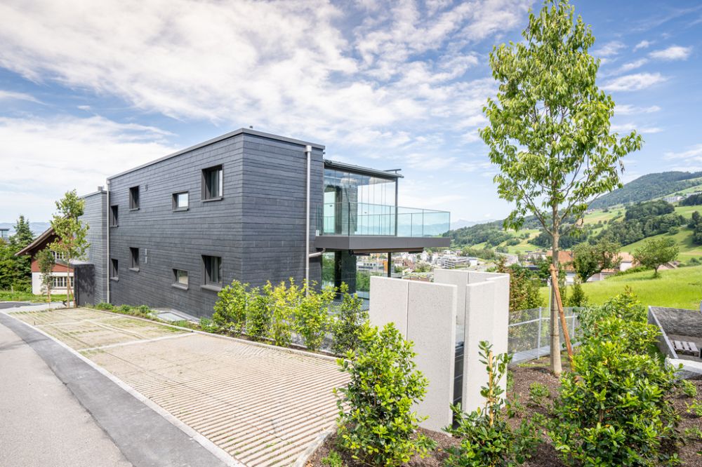 Exklusive 4.5 Zimmer Gartenwohnung mit Fernsicht (Neubau) - Aussenansicht