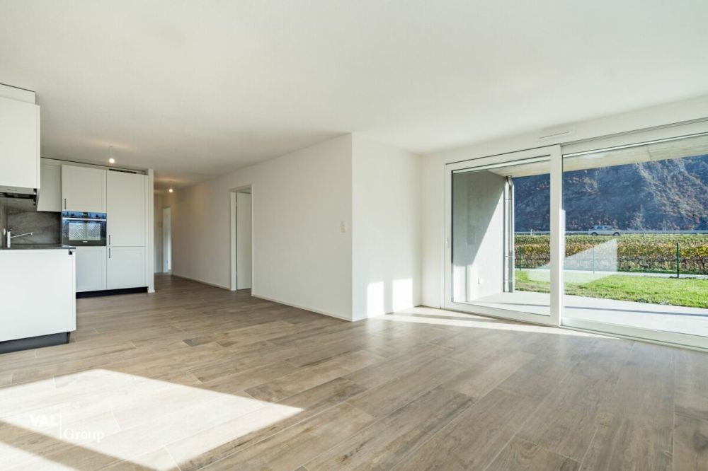 Élégant 3.5 pièces neuf avec terrasse, jardin et place de parc - Bild 1