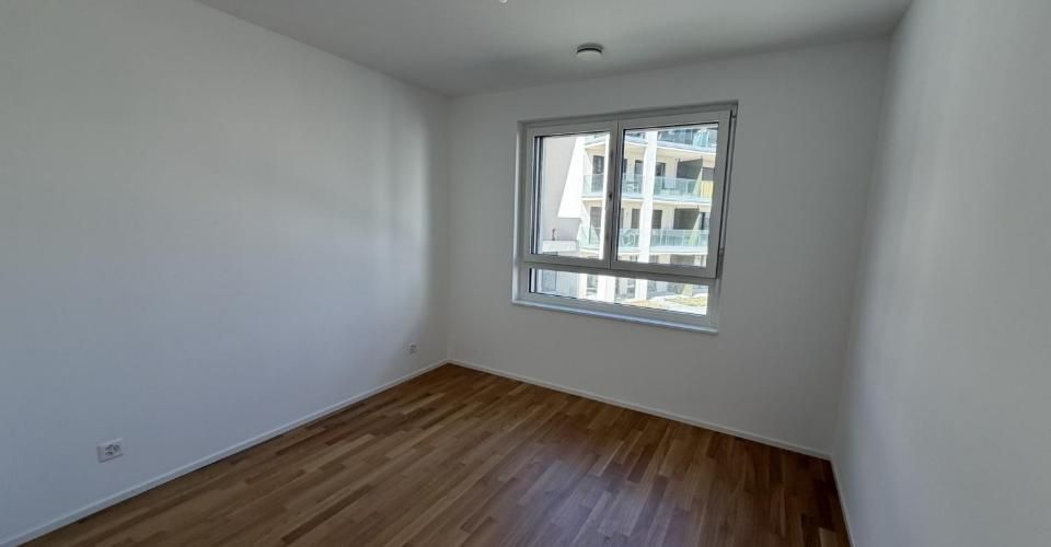 Magnifique appartement de 2.5 pièces au 1er étage d'un immeuble neuf avec balcon - E102 - Appartement 2.5 pièces - image - 3