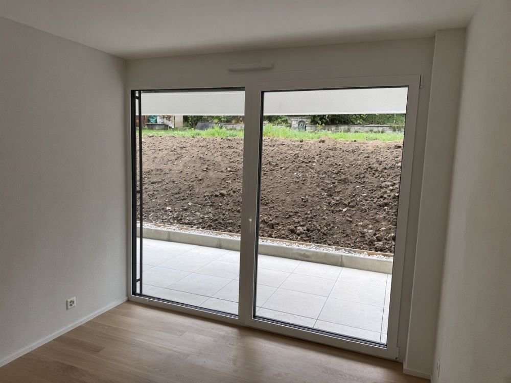 À louer - grand 2.5 pièces neuf avec terrasse et jardin exclusif - Bild 1