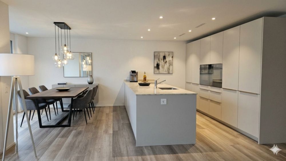 ERSTBEZUG Neubau - Sonniges Wohnen am ehemaligen Rebhang in Stäfa - Küche Esszimmer (visualisiert)