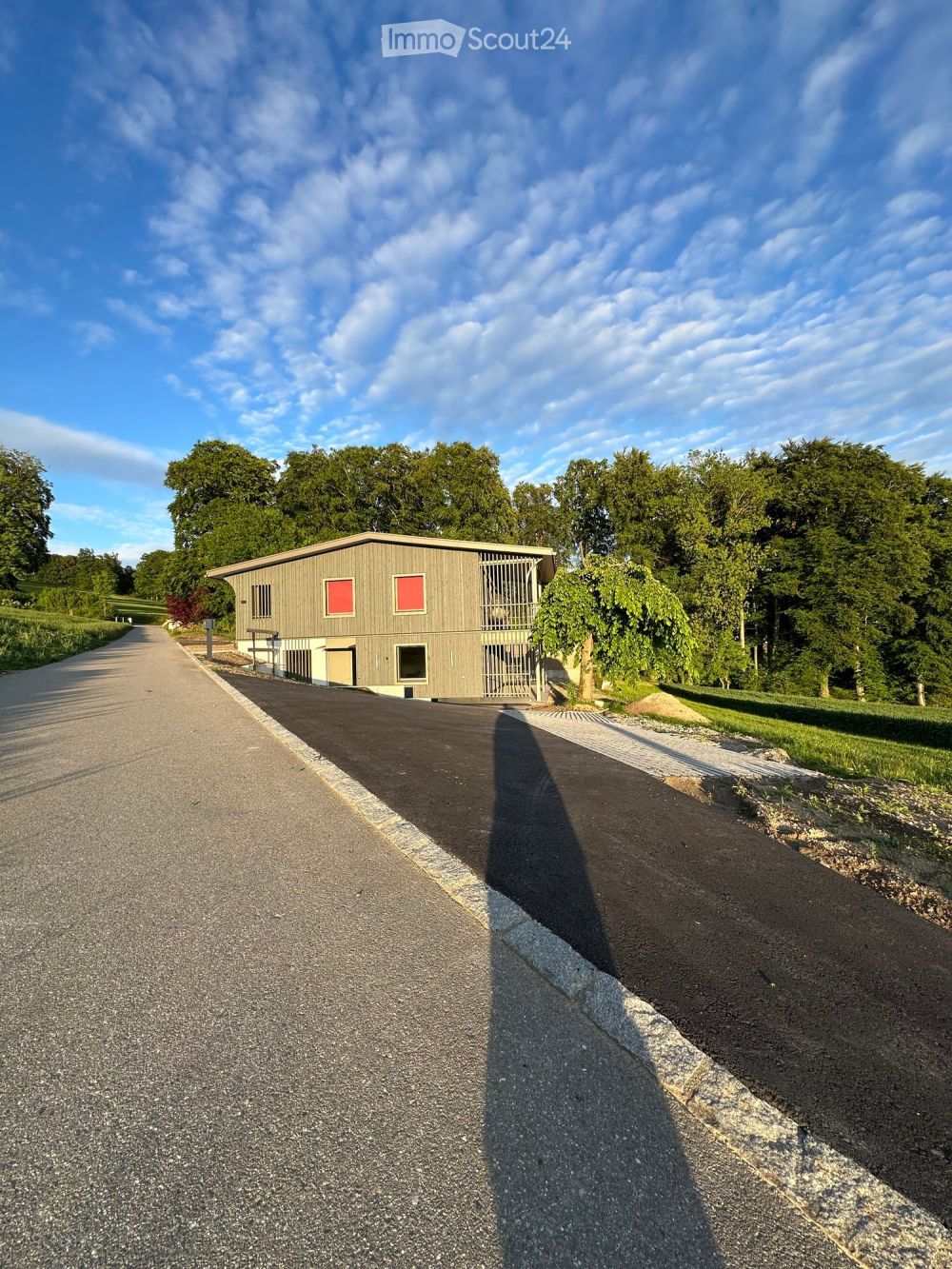 Wohnen wie im eigenen Haus – Erstbezug in einzigartiger Naturlage mit Seesicht in Eich - Bild 1