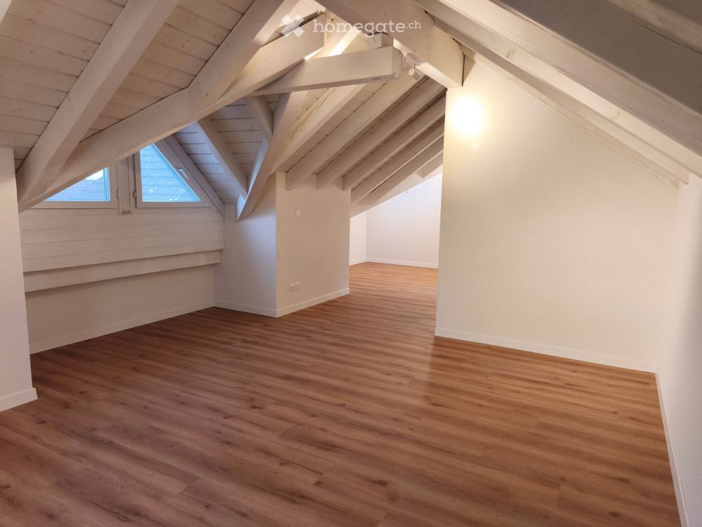 4.5 Zimmer-Dachmaisonette mit Cheminée und zwei Tiefgaragenplätzen - Bild 9