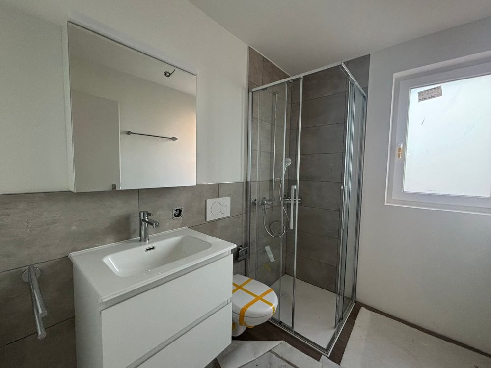 Moderni appartamenti di 2.5 locali con grande giardino in prima locazione a Cadenazzo - Bild 6