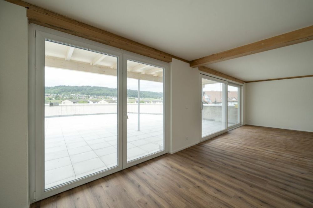 Exklusive 4.5-Zimmer-Attikawohnung mit ca. 163 m² Sonnenterrasse - Erstbezug im Neubau - Bild 5