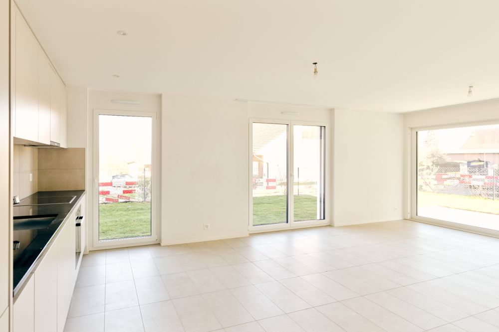 4.5 pièces neuf au rez avec jardin, idéal pour une famille - Bild 1