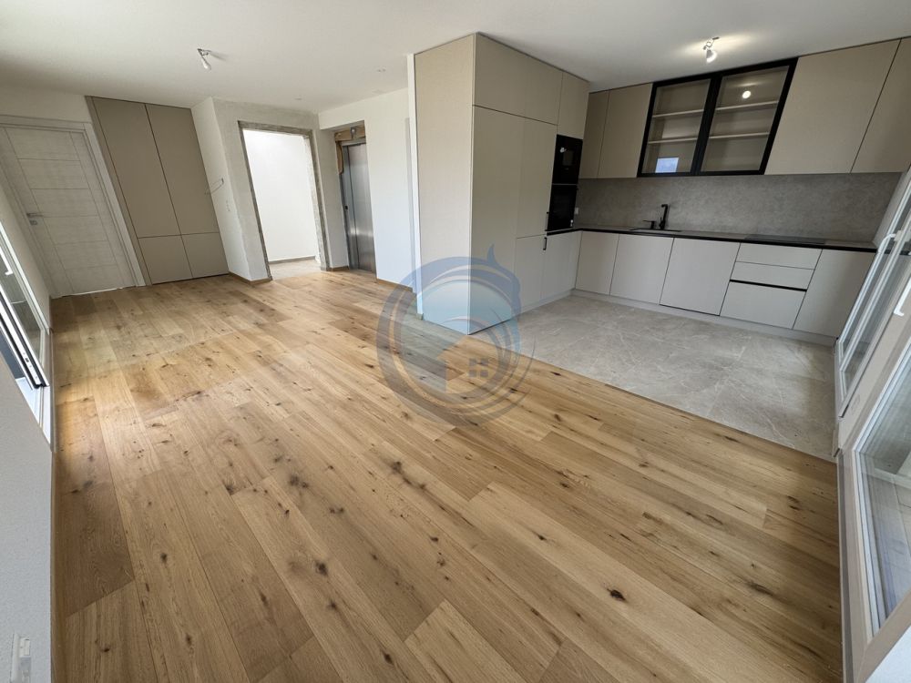 APPARTEMENT DE 2,5 PIÈCES EN ATTIQUE AVEC VUE PANORAMIQUE SUR LE LAC - Bild 2