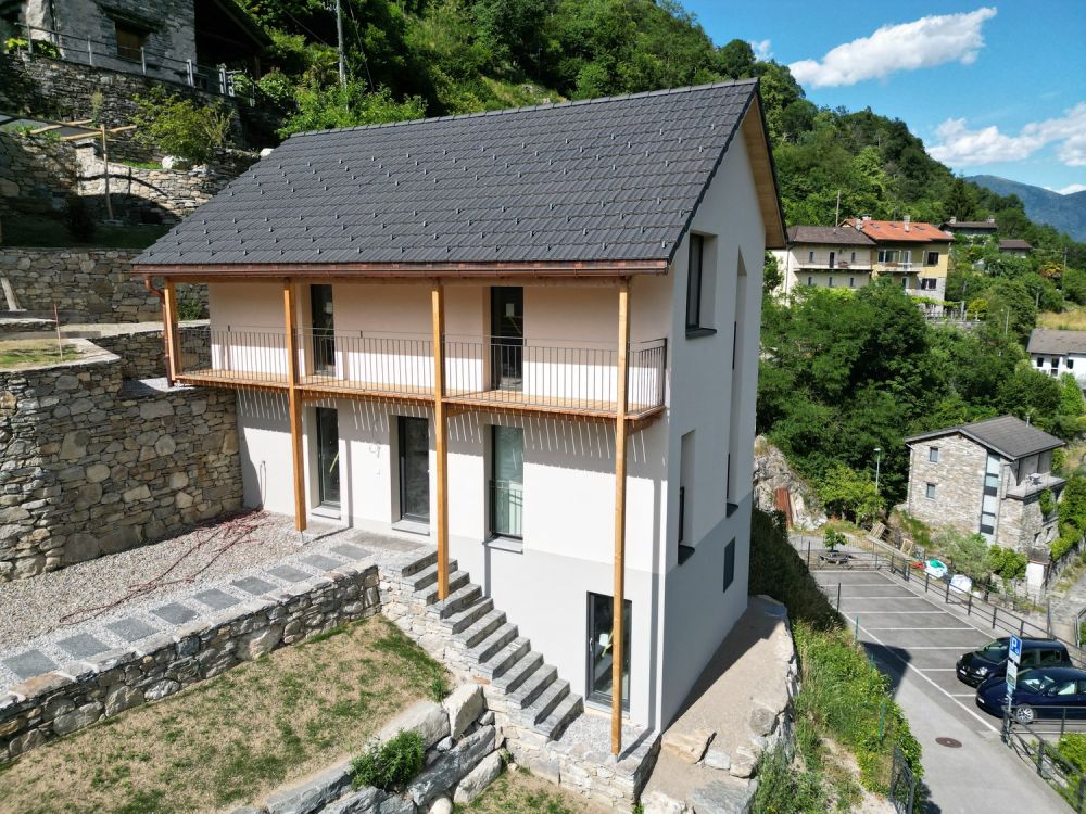 Casa unifamiliare con terreno e posti auto coperti - Bild 9