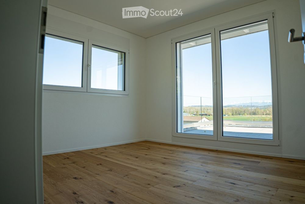 Exklusiv 5,5 Zimmer-Wohnung in Villa mit Blick auf den See und die Berge - Bild 12
