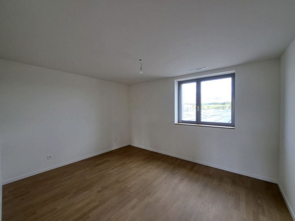Attique neuf de 4.5 pièces avec activité de conciergerie - Chambre_2.png