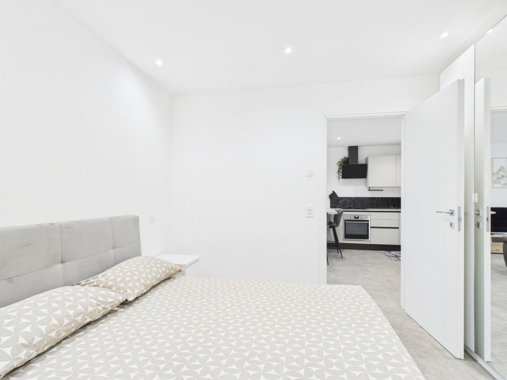 NUOVA COSTRUZIONE:APPARTAMENTO DI 3,5 LOCALI CON GIARDINO E POSTO AUTO - Bild 8