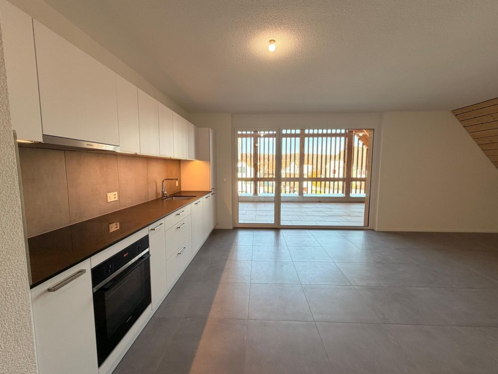 Appartement neuf de 3.5 pièces à Coeuve avec très grand balcon - Bild 1