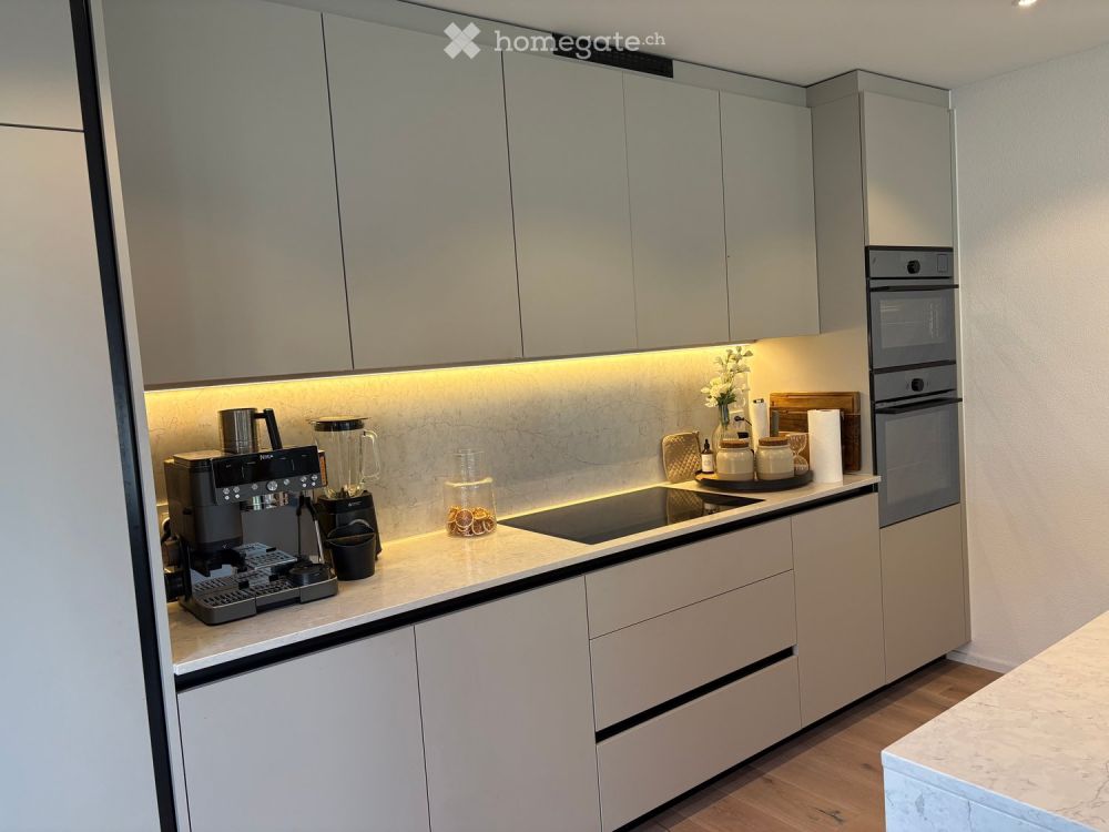 Luxuriöse 4.5-Zimmer-Gartenwohnung mit Bergblick und Seenähe - Bild 4
