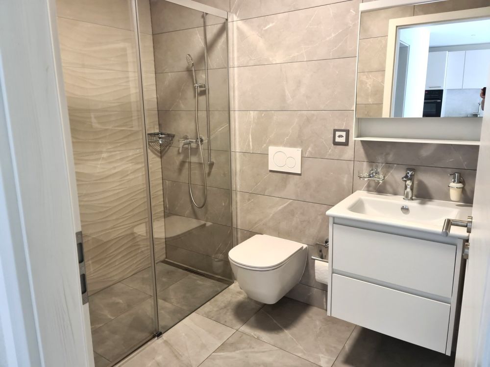 A louer magnifique appart. de 2,5 pièces dans immeuble comme neuf avec place de parc dans le garage - Bild 4