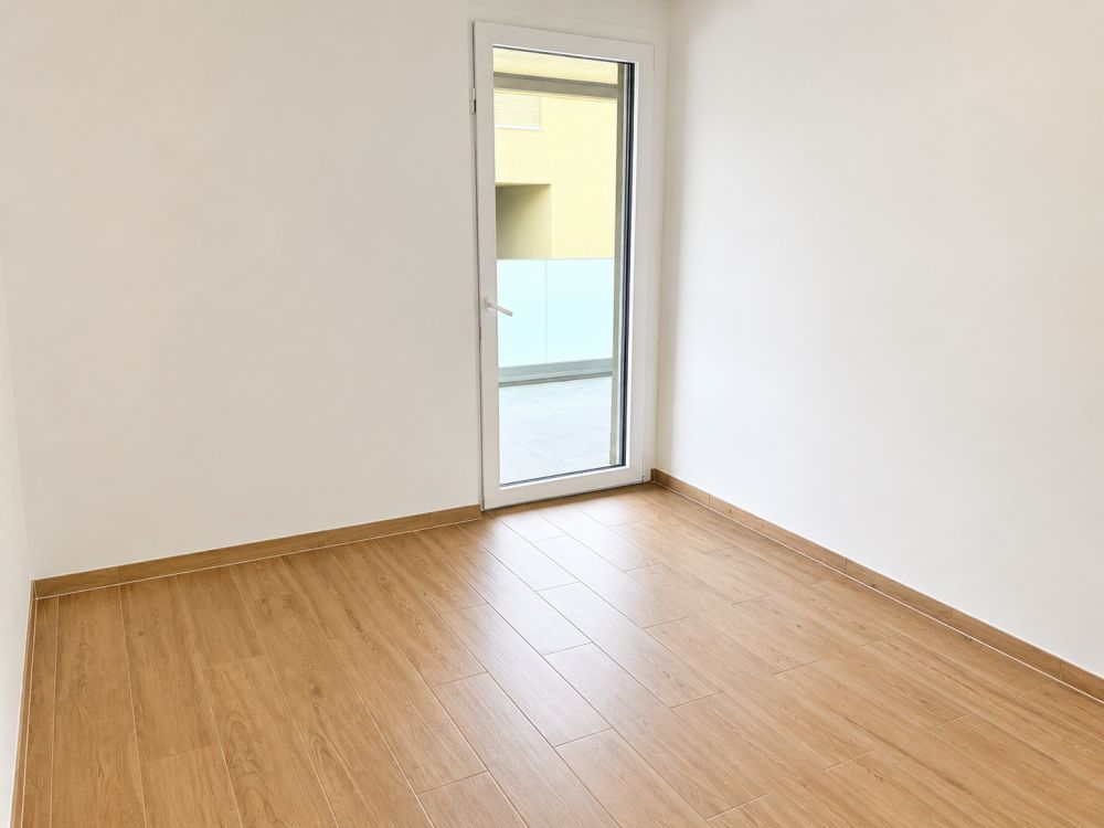 1er étage – Neuf – Places de parc intérieure – Grand balcon - Bild 7