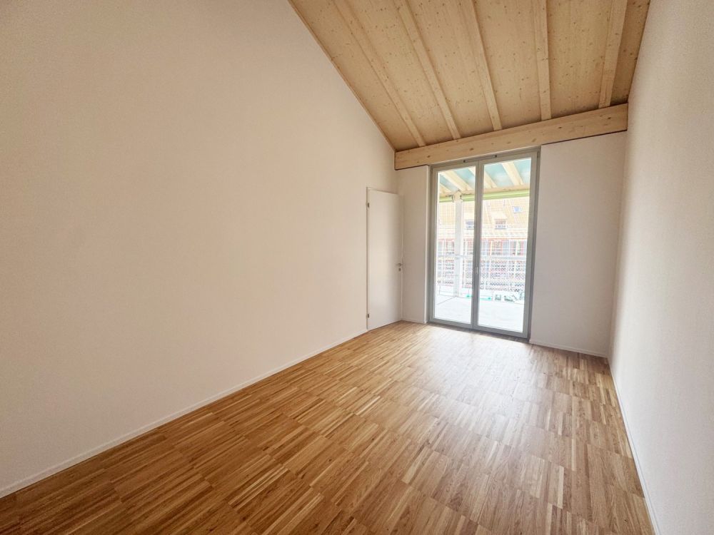 Moderne 3.5-Zimmer-Wohnung mit hohen Decken und Liftzugang - Bild 7
