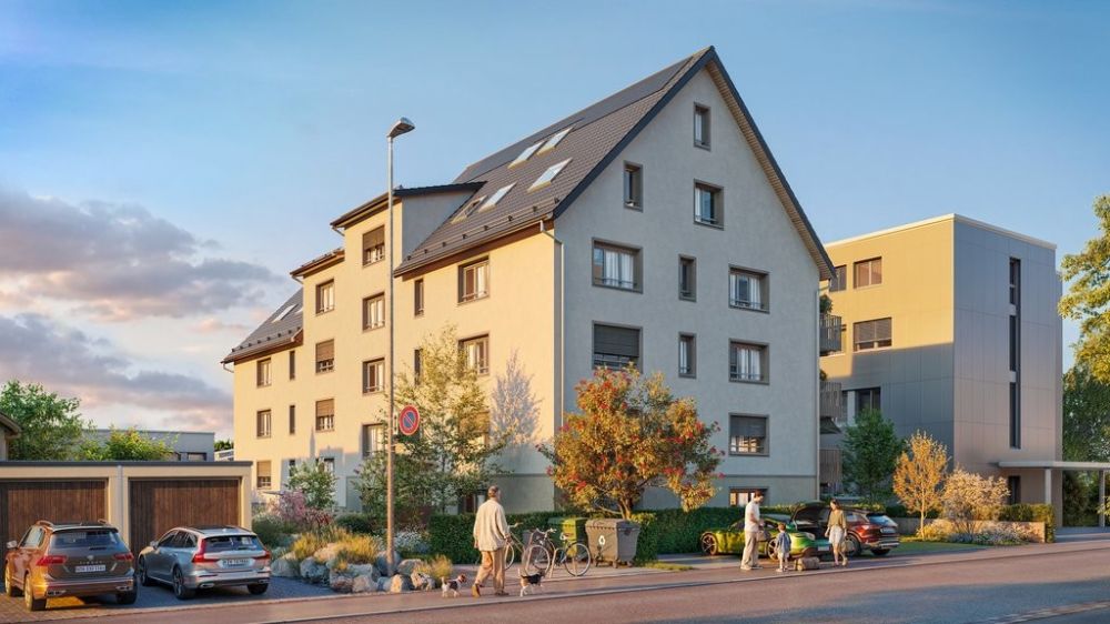 Modernes Wohnen im Neubau ADLIBOGEN - 1.5-Zimmerwohnungen - Aussenansich_Hauseingang.jpg