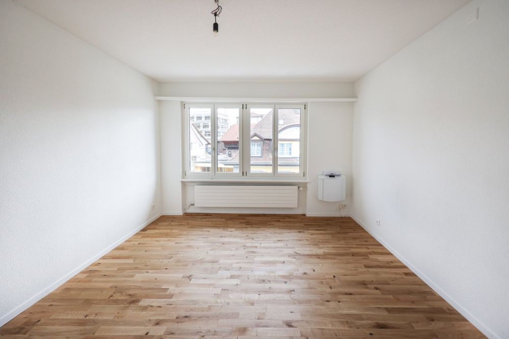 Attraktive, kernsanierte Wohnung inmitten von Wohlen - Schlafzimmer
