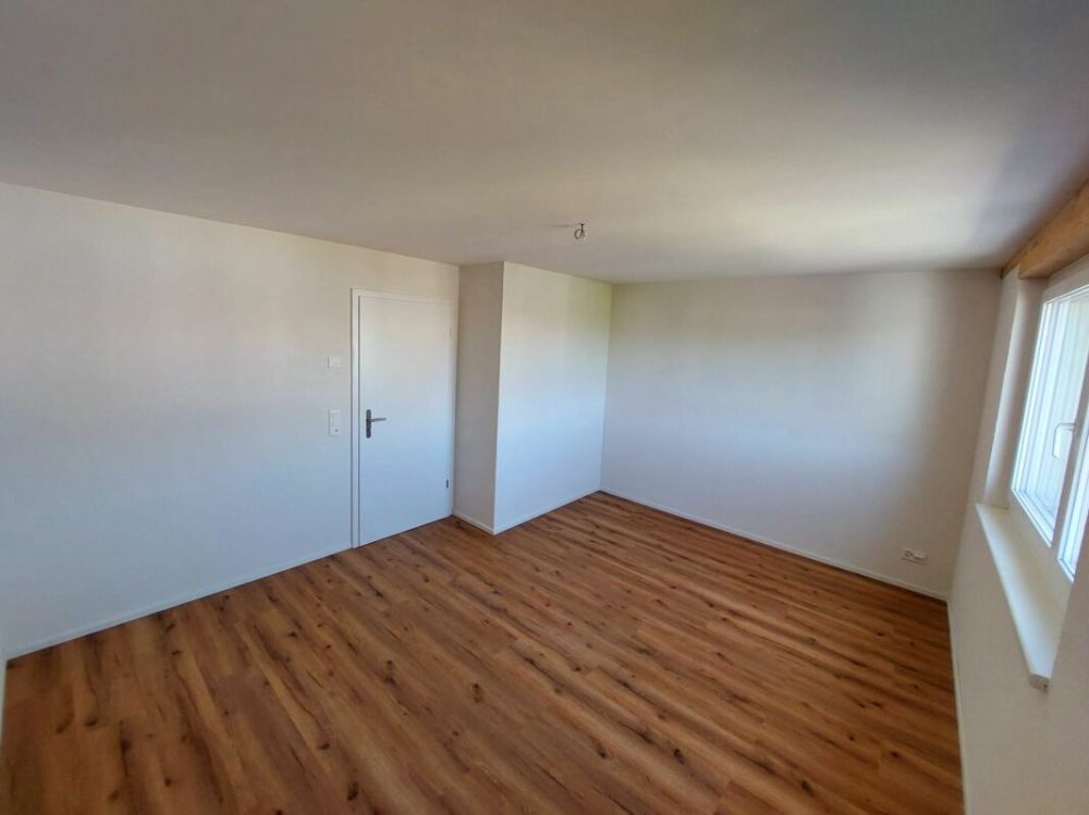 Exklusive 2.5-Zimmer-Attikawohnung mit ca. 74 m² Sonnenterrasse - Erstbezug im Neubau - Bild 10