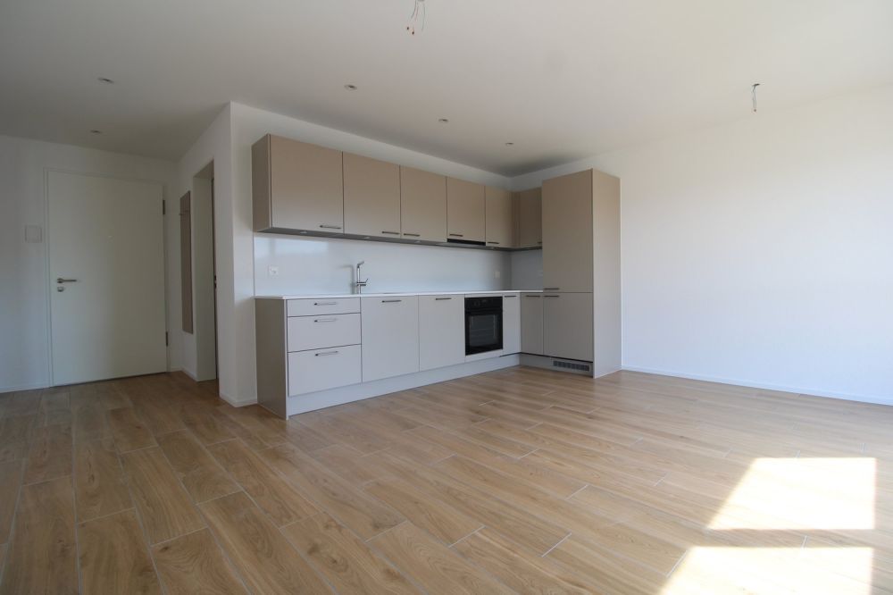 Attraktive 2.5-Zimmer-Wohnung mit Balkon an zentraler Lage in Niederuzwil - Bild 1