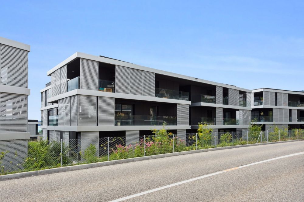 Appartement dans un immeuble neuf au bord du lac - Aussenansicht