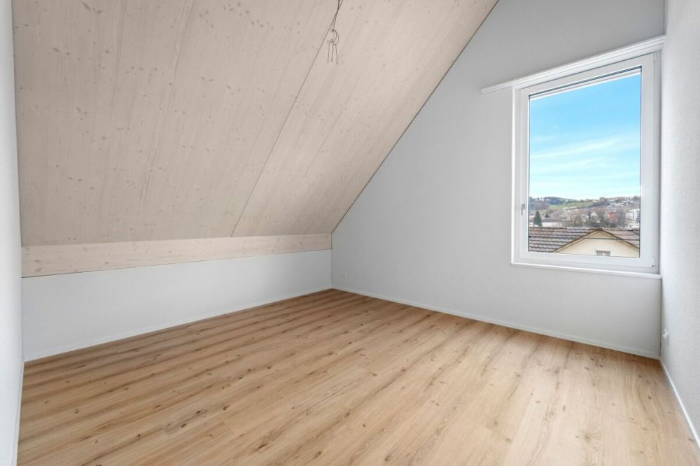 Erstbezug 5,5 Zimmer-Doppeleinfamilienhaus - Zimmer 1 Dachgeschoss