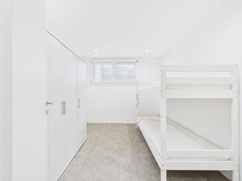 NUOVA COSTRUZIONE:APPARTAMENTO DI 3,5 LOCALI CON GIARDINO E POSTO AUTO - Bild 10