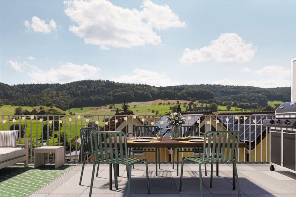 ERSTVERMIETUNG 6.5-Zi.-Reiheneinfamilienhaus mit PV-Anlage - obererchrueziweg_innen_eg_balkon_aussicht_Haus02.jpg