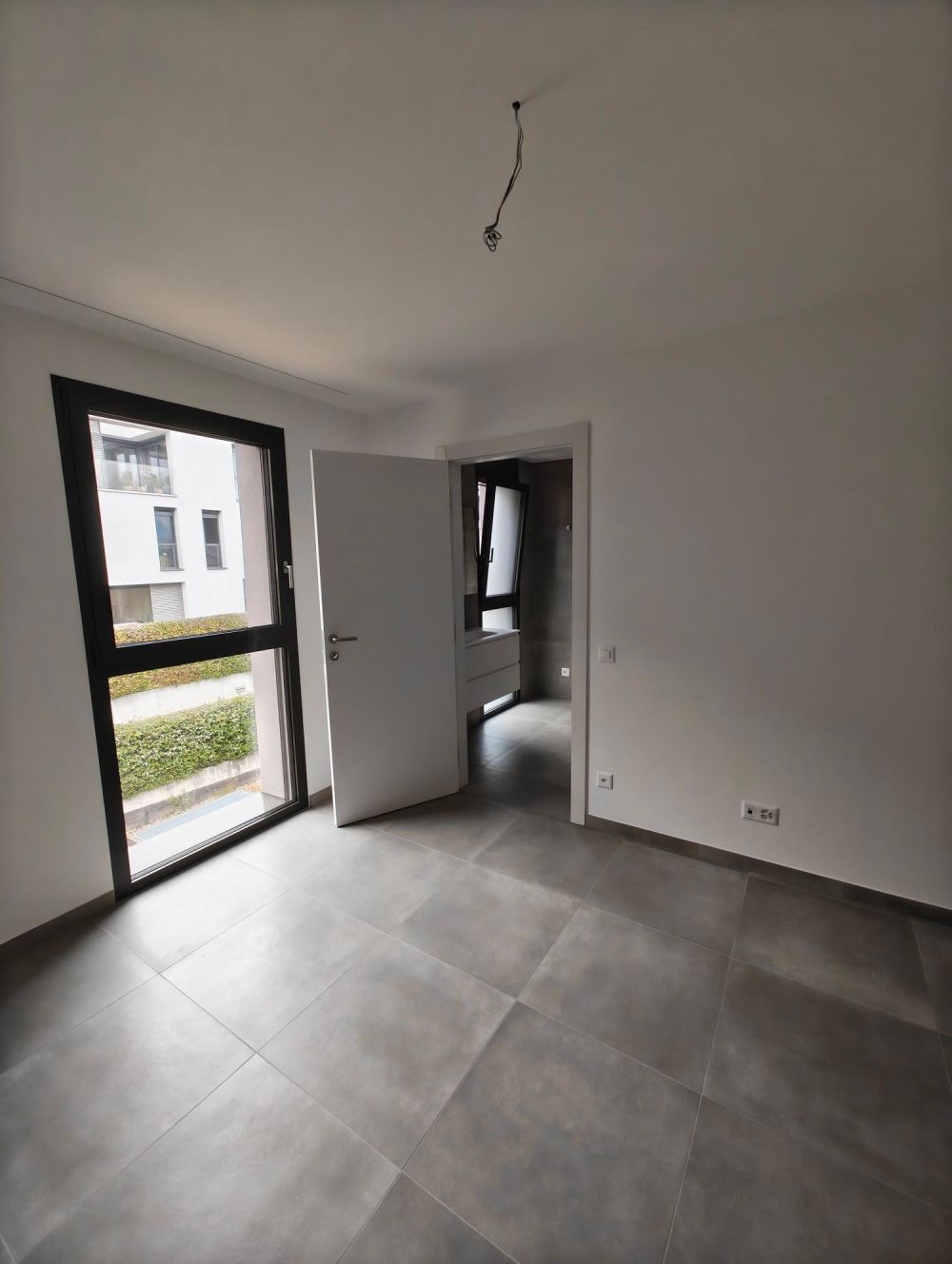 Elegante appartamento 4.5 locali a Lamone - Bild 6