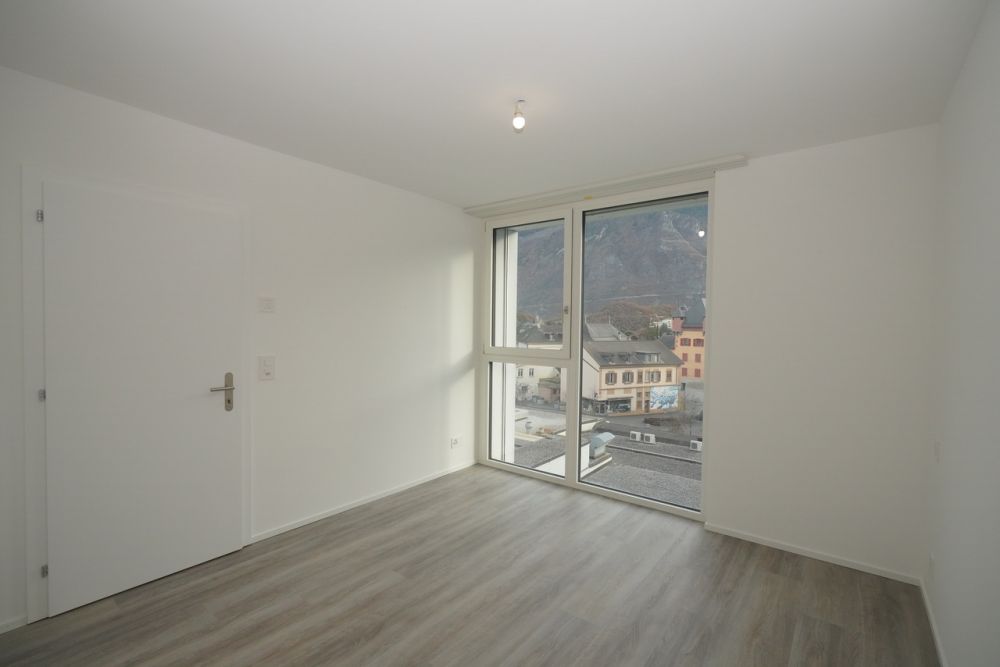 APPARTEMENT 2.5 PIÈCES À LOUER AU CENTRE DE SIERRE - Chambre