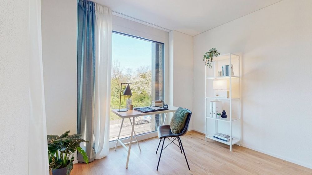 Wohnen auf dem alten Läckerlihuus-Areal - 3.5-Zi-Whg-Muenchenstein-Zimmer-1-1.jpg