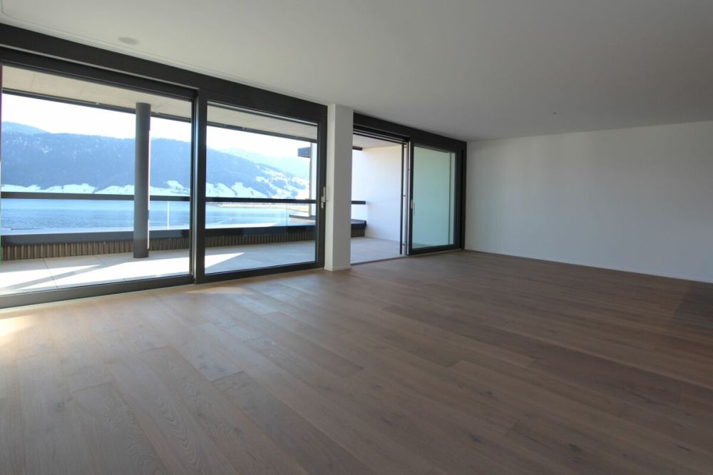 EIN JUWEL ÜBER DEM SEE: 3.5-Zimmer-Luxus-Neubauwohnung mit spektakulärem Panorama auf See und Berge - Bild 3