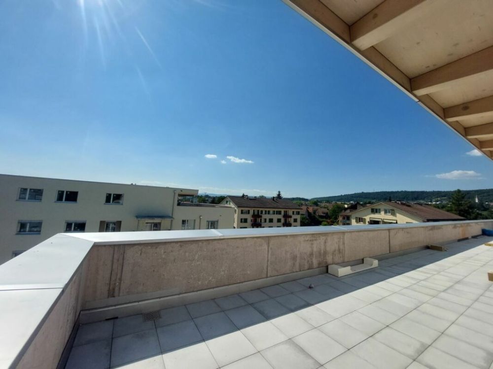 Exklusive 2.5-Zimmer-Attikawohnung mit ca. 74 m² Sonnenterrasse - Erstbezug im Neubau - Bild 7