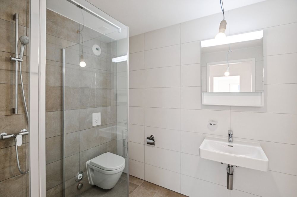 Logement dans récent quartier situé au coeur de la ville d'Orbe - Bad