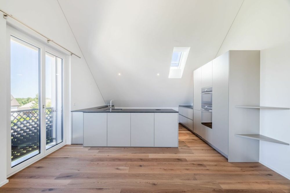 NEUBAU: Dachwohnung mit 4.5-Zimmern und Aussicht ins Grüne - Bild 3