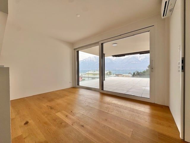 AFFITTASI A MINUSIO - ATTICO DI 2.5 LOCALI CON VISTA LAGO - Bild 7