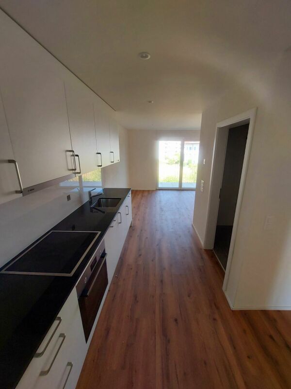 Moderne 1.5-Zimmer-Neubauwohnung mit grosszügigem Balkon - Erstbezug - Bild 1