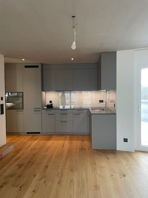 Erstbezug: Moderne 2.5-Zimmer-Neubau-Wohnung in Buchs ZH - Bild 1