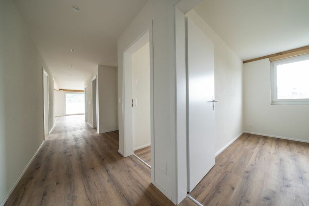 Exklusive 4.5-Zimmer-Attikawohnung mit ca. 163 m² Sonnenterrasse - Erstbezug im Neubau - Bild 10