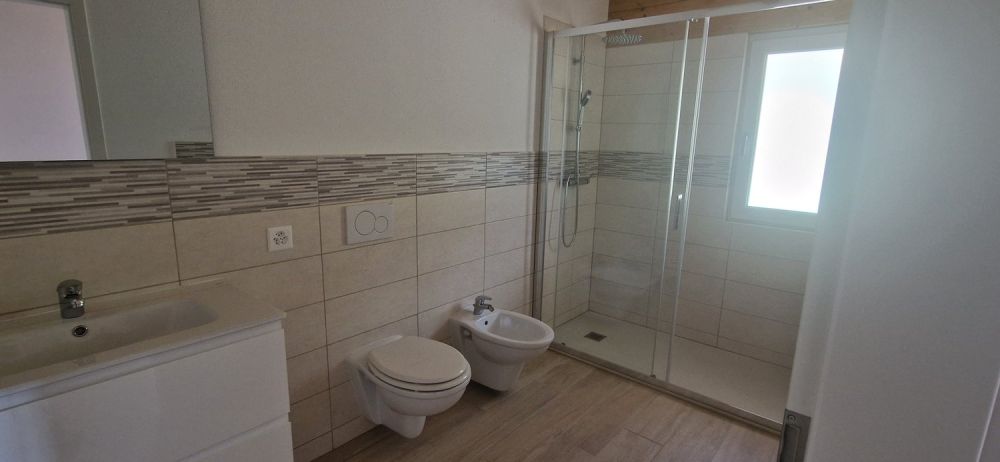 Casa unifamiliare moderna a Osogna - 3.5 locali con giardino - Bild 11