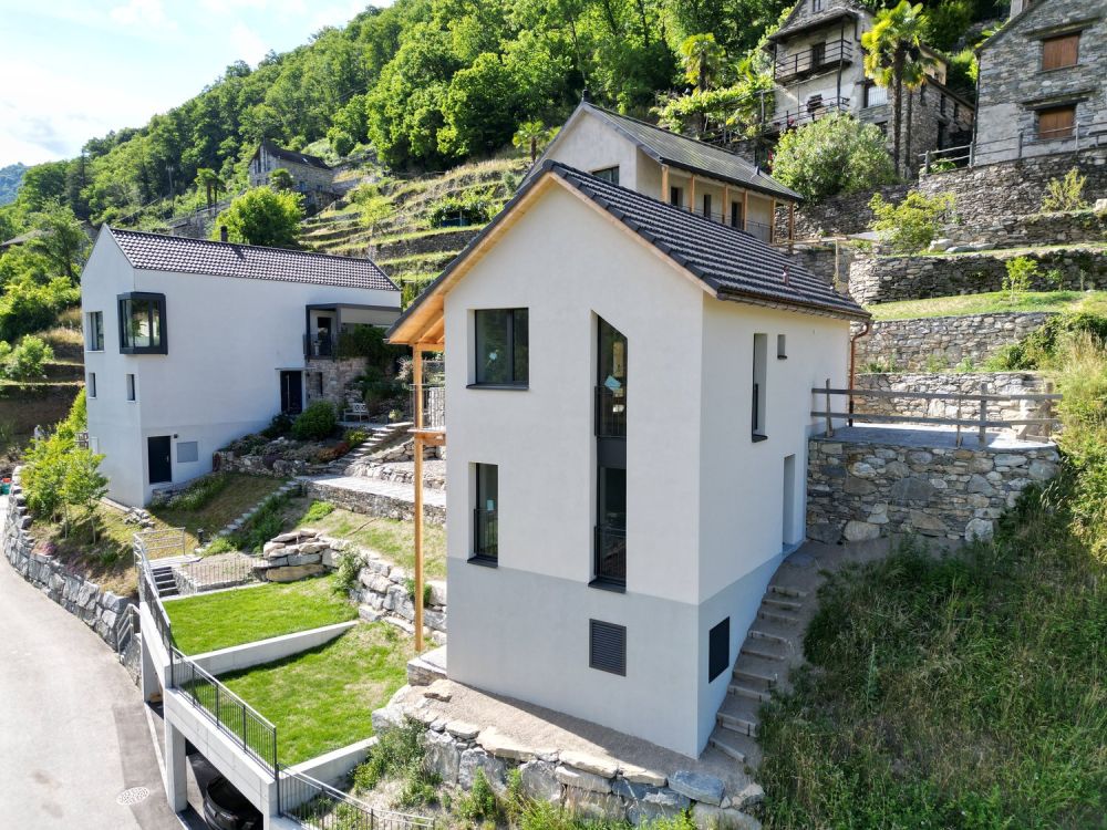 Casa unifamiliare con terreno e posti auto coperti - Bild 7