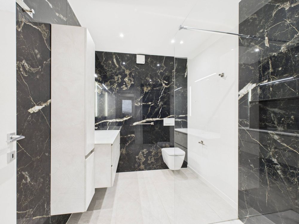 Nuova costruzione : Appartamento di 3,5 locali con giardino e posto auto - Bild 10