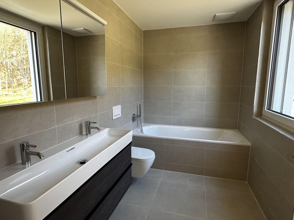 Idyllisches Wohnen - Erstvermietung 4.5-Zimmmer-Wohnung mit grosszügigem Sitzplatz - Bild 7