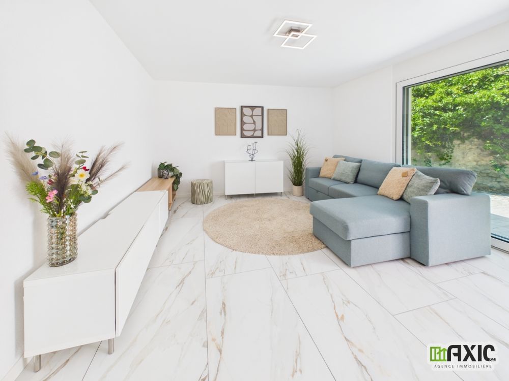 À LOUER - Nouveau 2.5 pièces au rez avec grande terrasse privative. - Bild 1